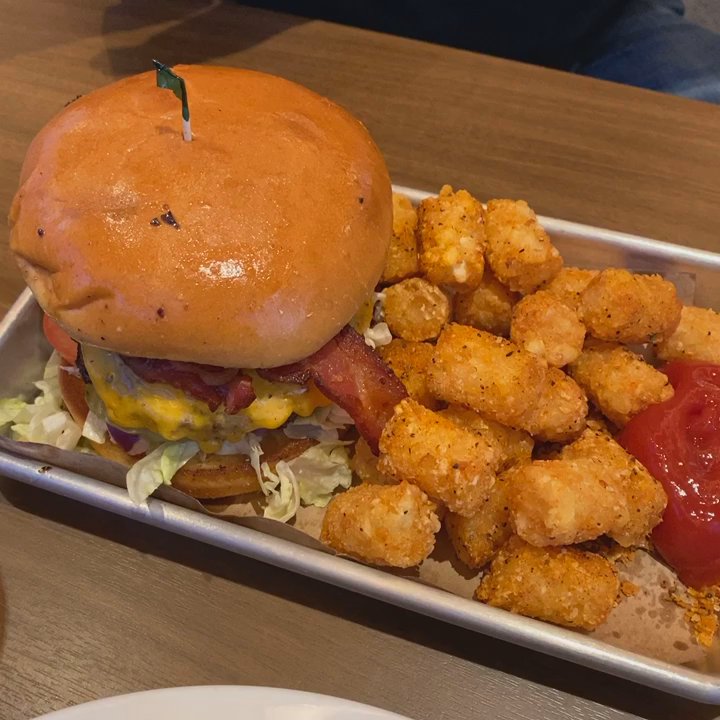 Coyote Entertainment Center - Burger and tots, Cobb salad with shredded cheese, kids mini corn dogs and fries.. delicious!! - Cinema Near Me - Lemoore, California