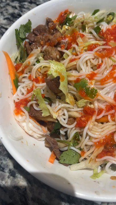 Pho Bistro - My husband got a noodle dish I think p35 and I got pho with flank steak, meatballs, and fatty brisket! Yum - Vietnamese Near Me - Carrollton, Texas