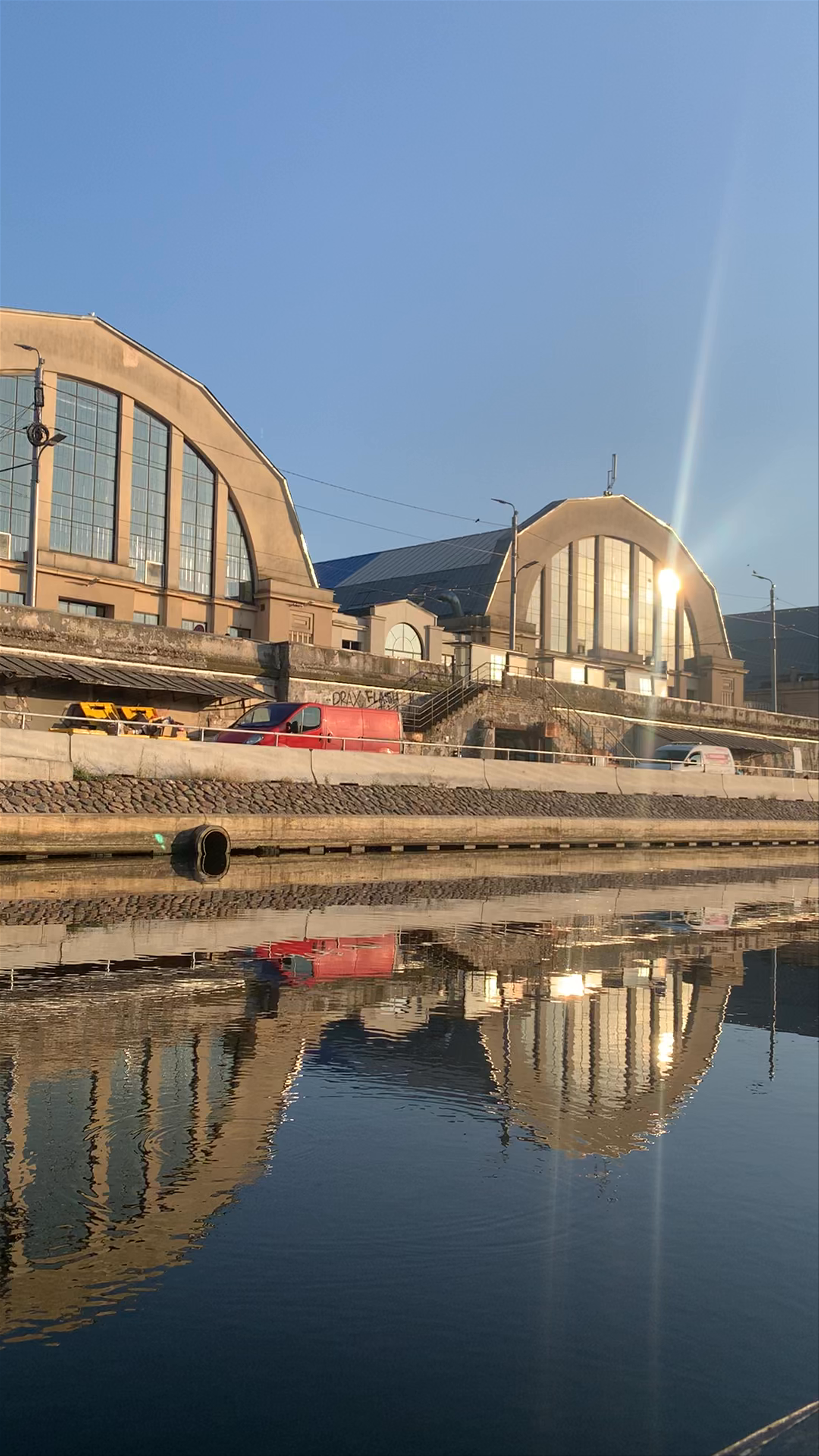 Rīgas Centrāltirgus: A Serene Boat Ride by Riga’s Iconic Market