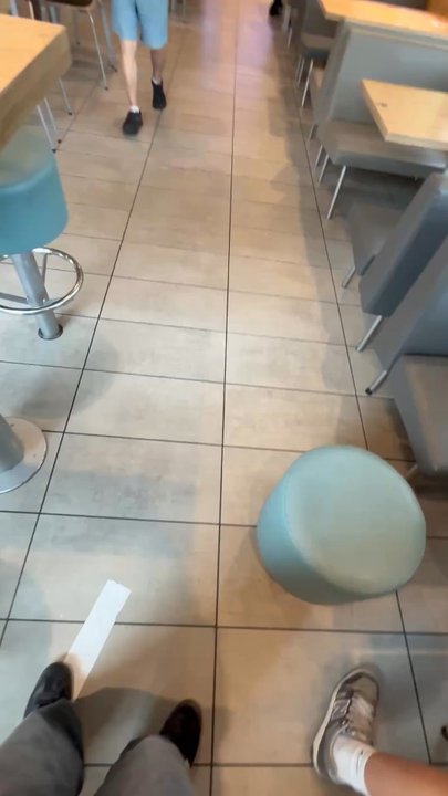 McDonald's - The food and service was decent but some of the guests were very disturbing and they're was a fly(circled in red) - Burgers Near Me - Seattle, Washington