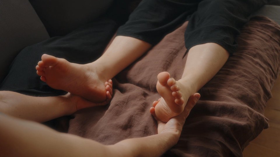 Zittende voetmassage
