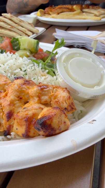 Luna Grill Temecula - Flat cut chicken for me and salmon and flat cut chicken for him - Mediterranean Near Me - Temecula, California