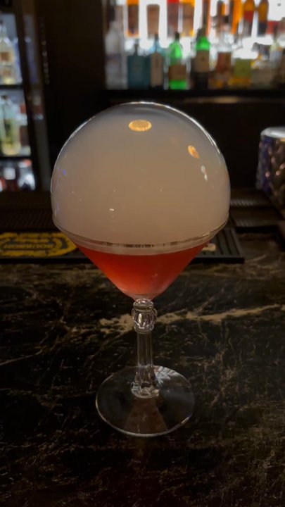 The Ebenezer - me popping the rosé martini - Cocktail Bars Near Me - Plymouth, Michigan
