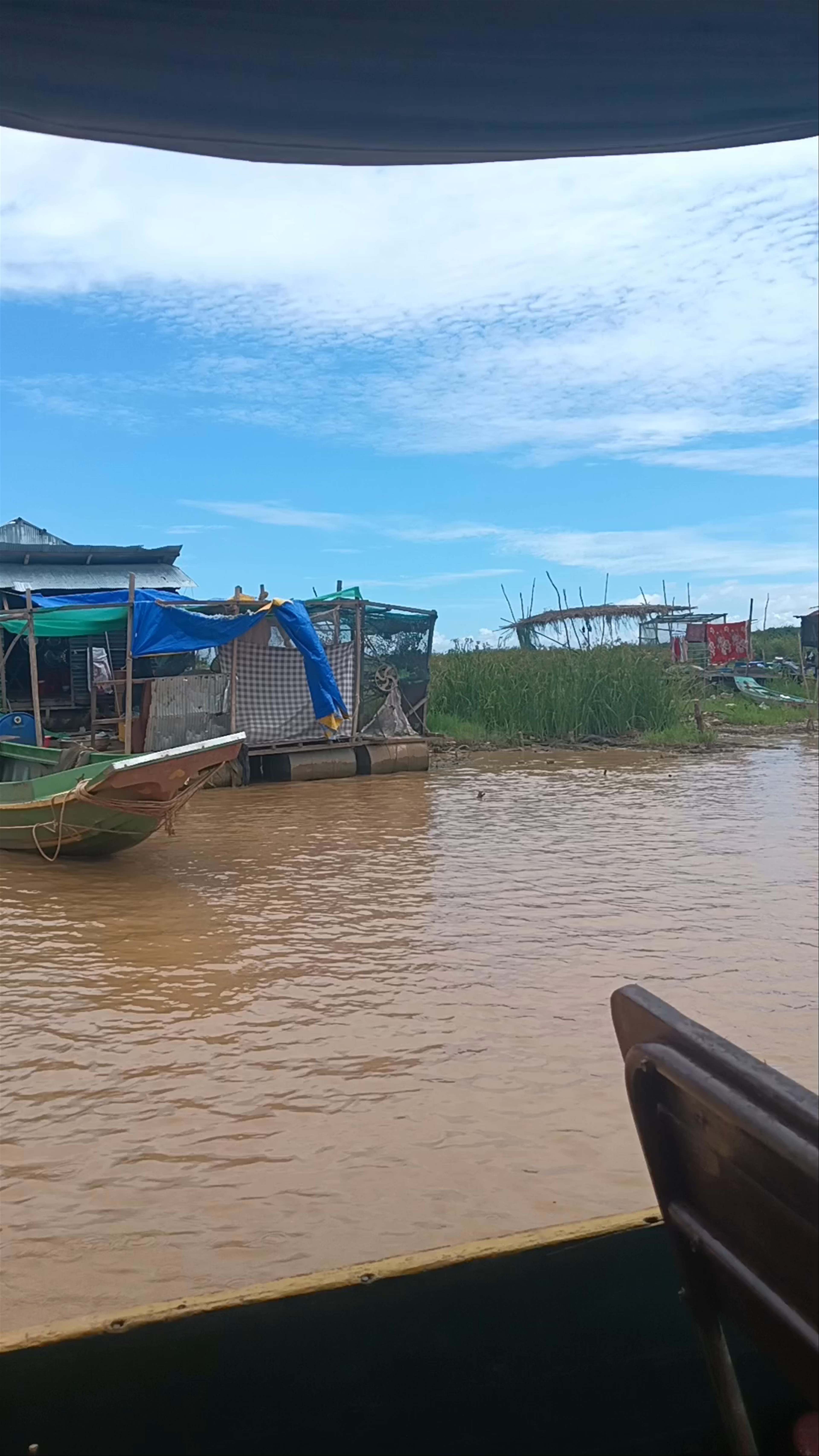 Serene Boat Journey Through Tonle Sap Floating Village, Phnom Krom, Cambodia