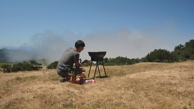 Man burning charcoal