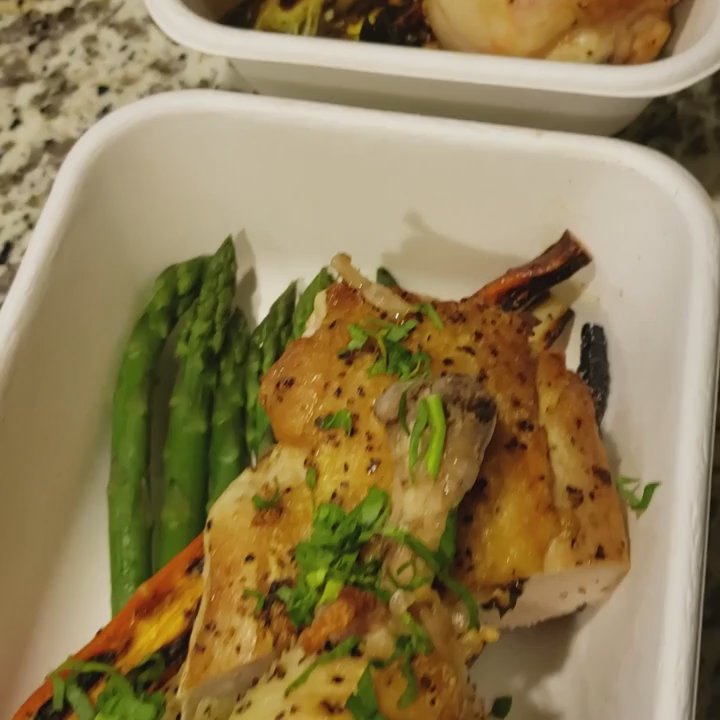 The Chef's Cuisine - Roasted chicken breast and leg paired with rainbow carrots and asparagus. - Food Delivery Services Near Me