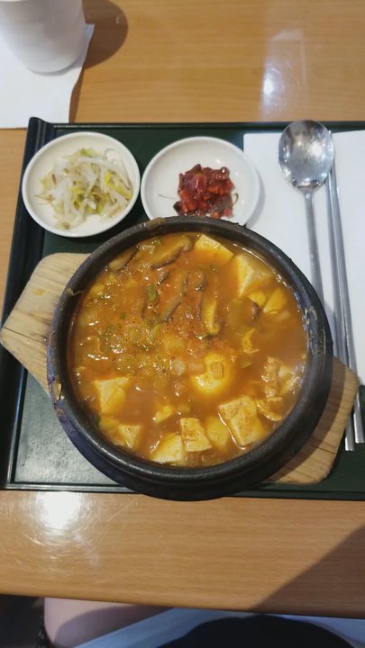 Charm Juk - Spicy Tofu came bubbling out!! - Korean Near Me - Carrollton, Texas