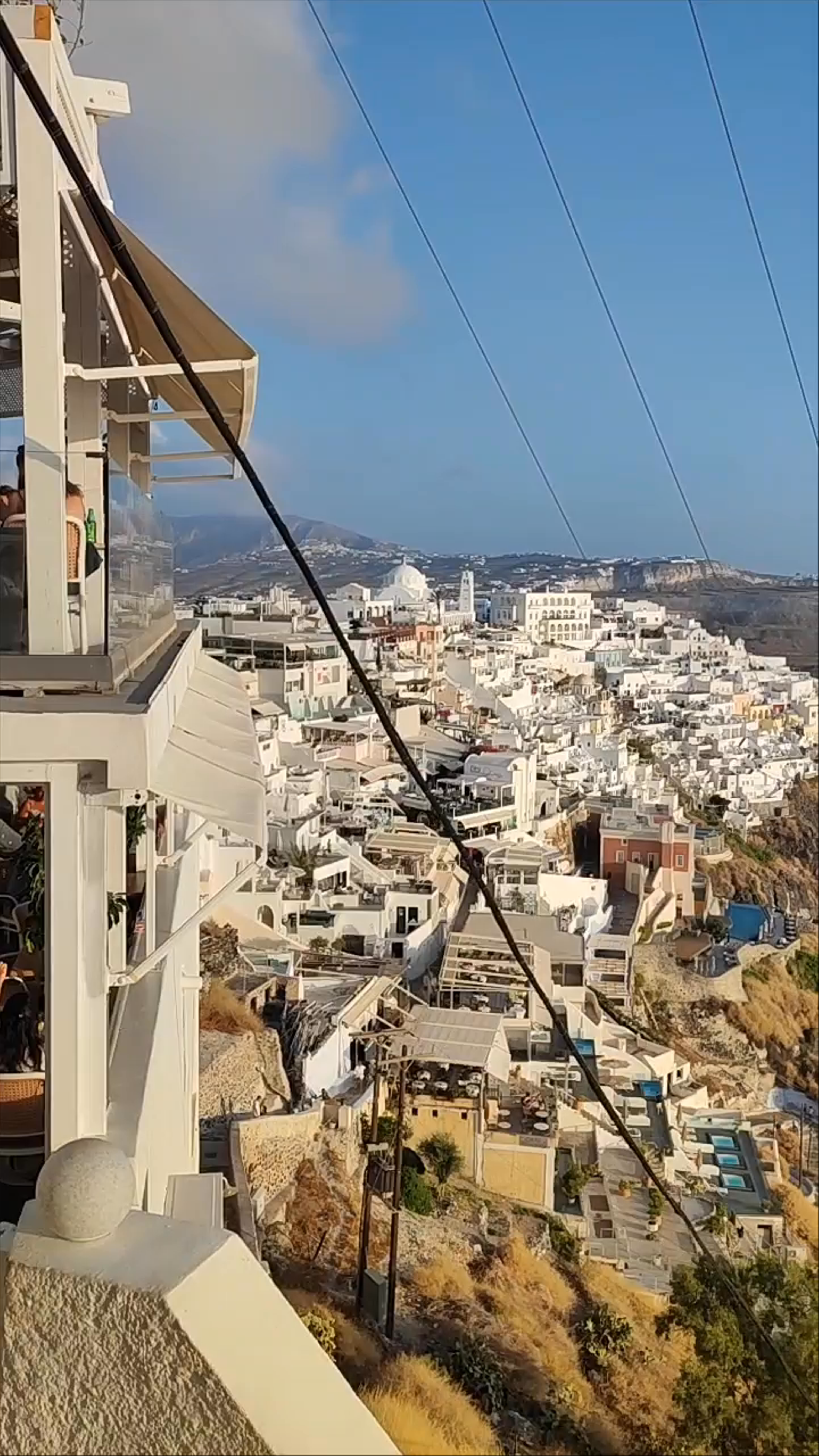 Panoramic View of Fira: Santorini’s Iconic Cliffside Charm