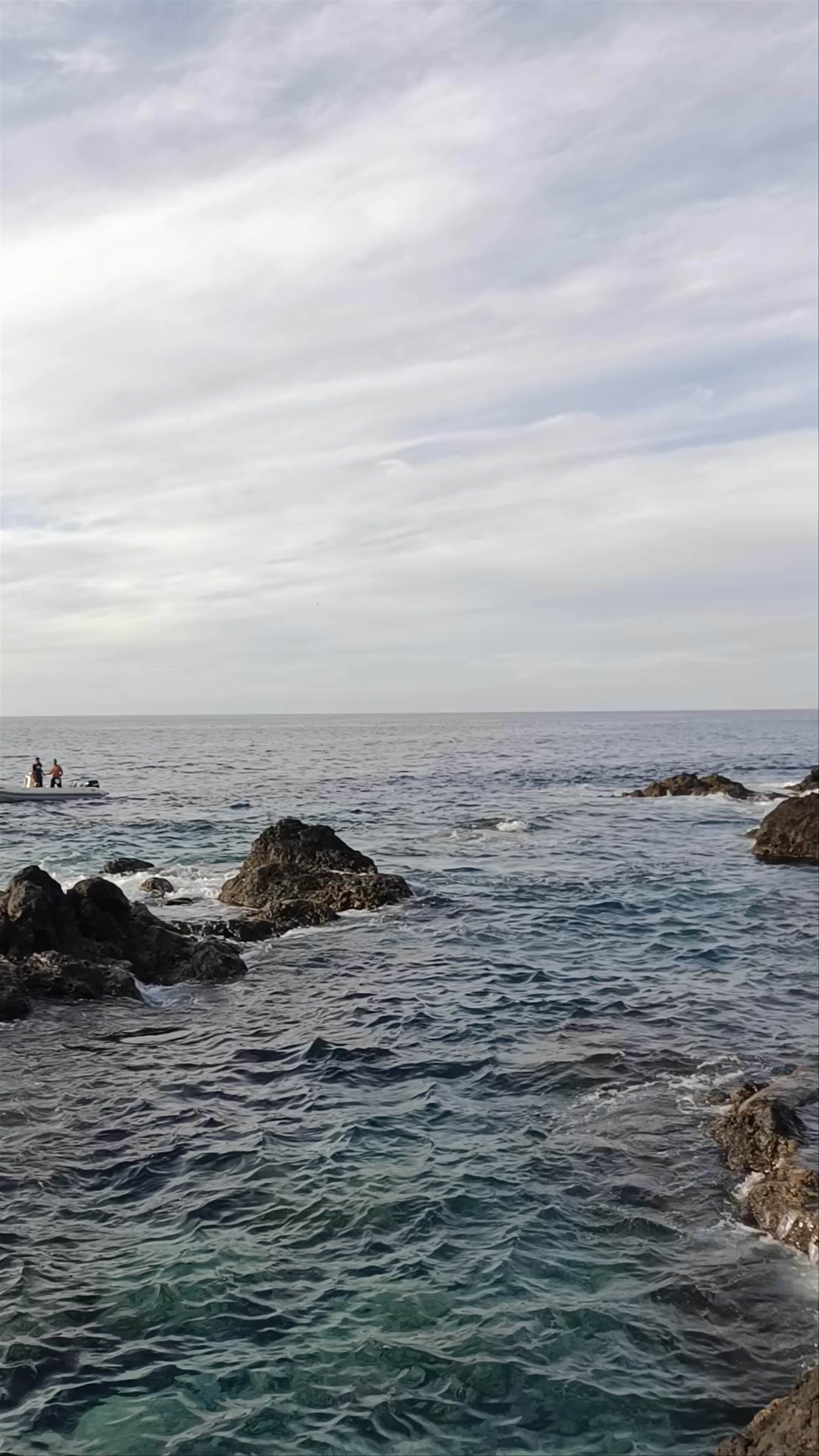 Garachico Coastal Serenity: Sunset by the Rocky Shores of the Canary Islands