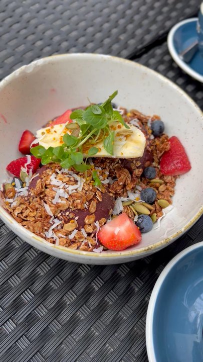 Two Hands - açaí bowl frozen açaí topped with granola, toasted pepitas, coconut, bee pollen, and seasonal fruit $14.50 - Cafes Near Me - New York, New York