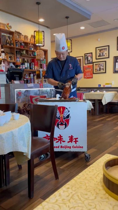Taste Good Beijing - Chef slicing and serving Peking duck. - Chinese Near Me - Milpitas, California