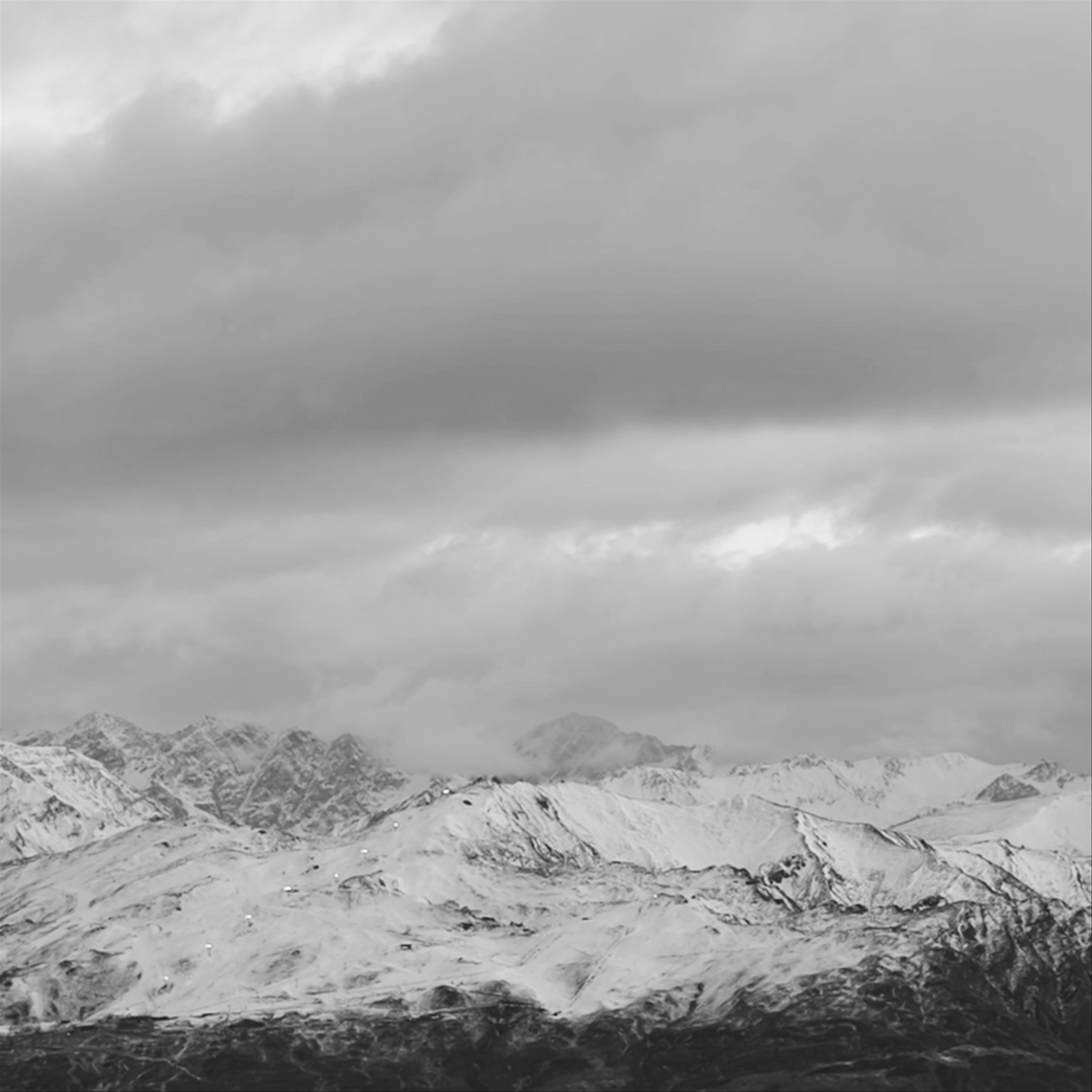 Timelape video of clouds rolling over snowy mountain in New Zealand