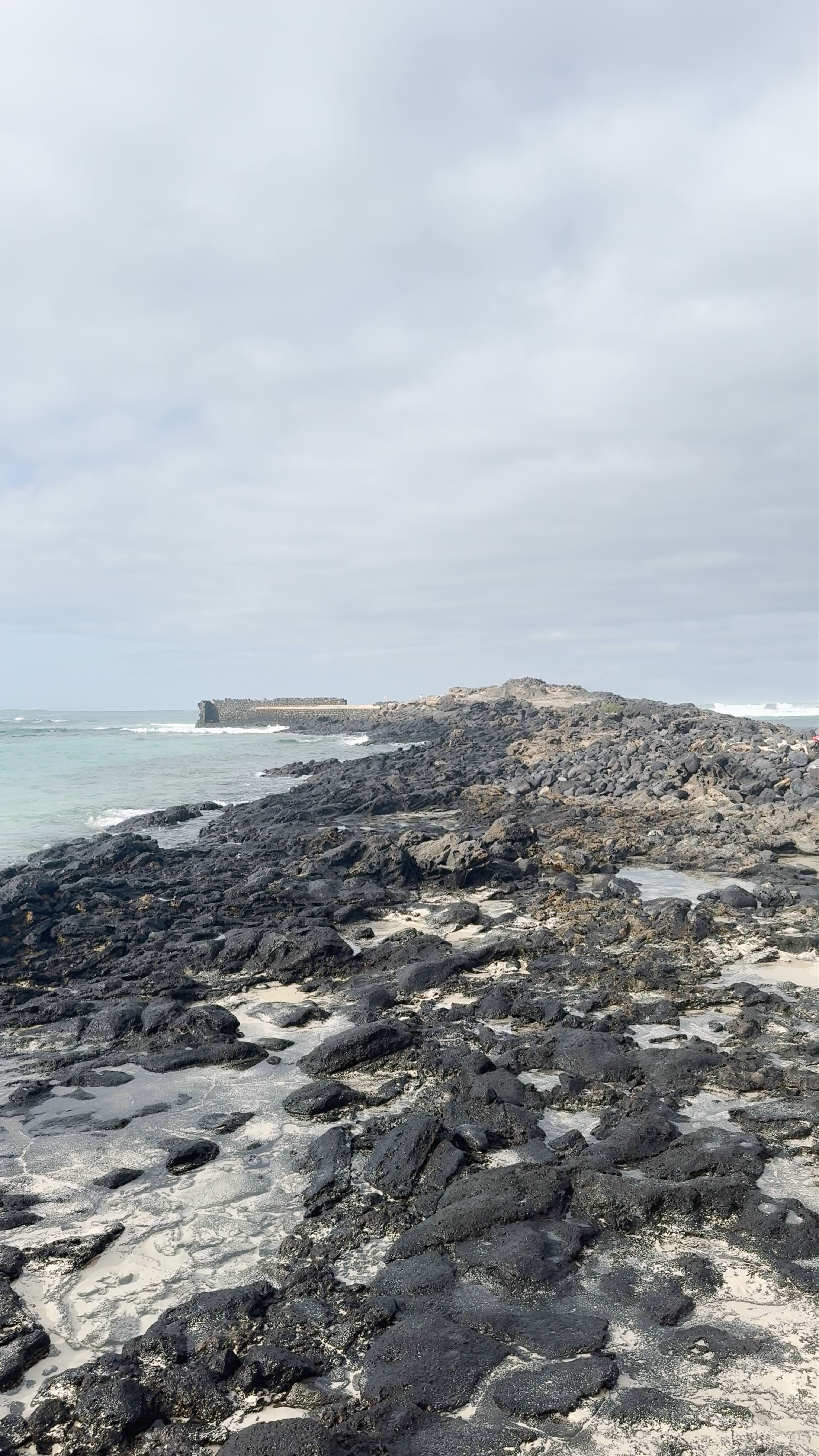 Playa Chica: Hidden Coastal Gem in Los Lagos, Spain