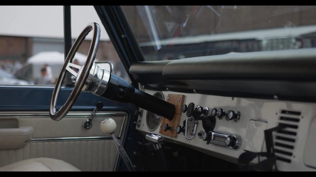 ​​The steering wheel of a vintage Ford Bronco