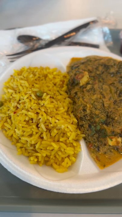 Rajun Cajun - Curry Chicken, yellow rice, and spinach - Soul Food Near Me - Chicago, Illinois
