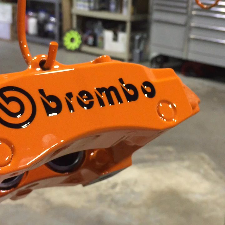 Bmore Kreative Custom Coatings - Brembo brake calipers powder coated in international orange with black vinyl logos under a powder coat clear. - Powder Coating Near Me - Elkridge, Maryland