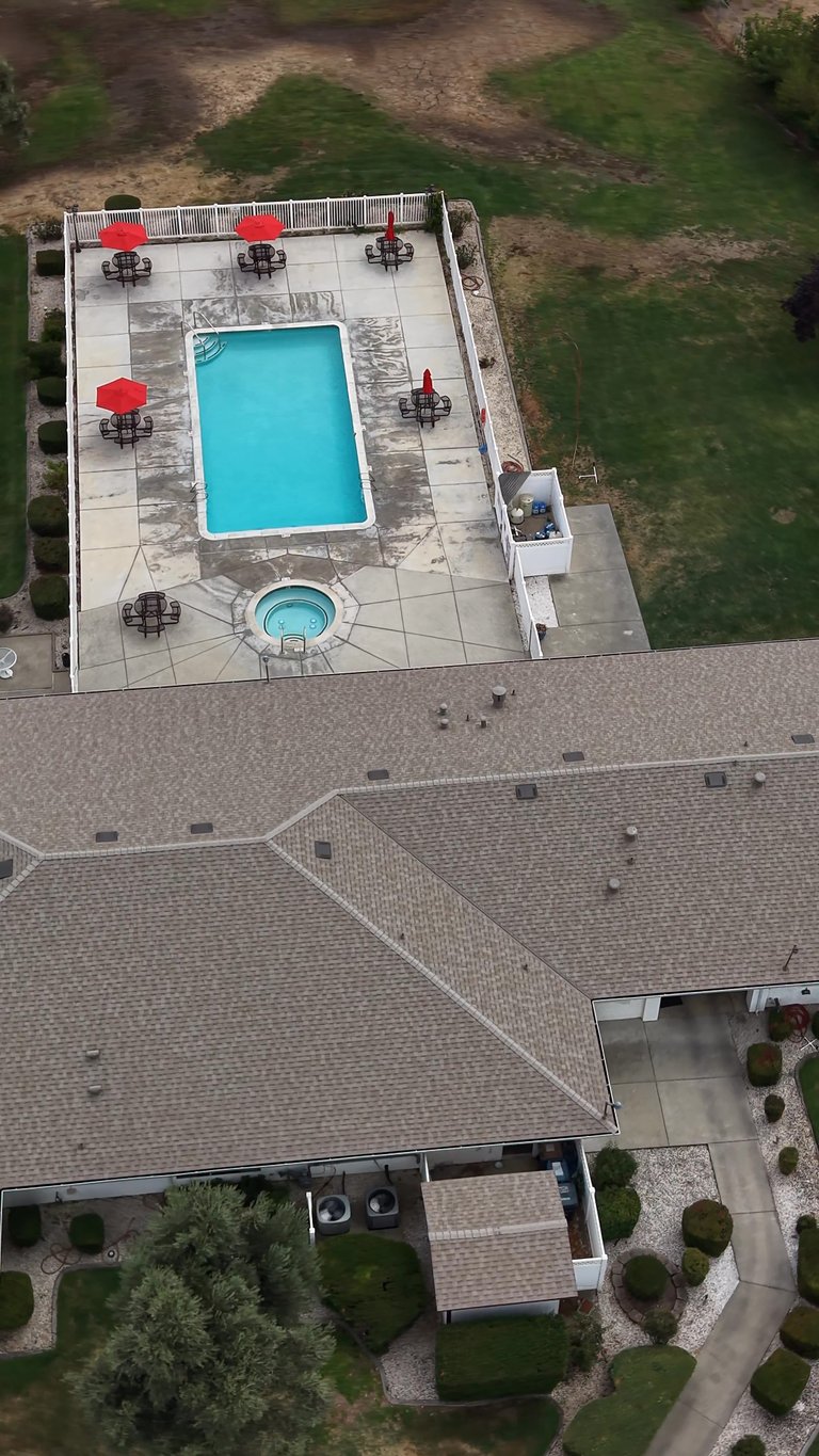 Drone footage of a completed roof replacement in Sacramento, California.
