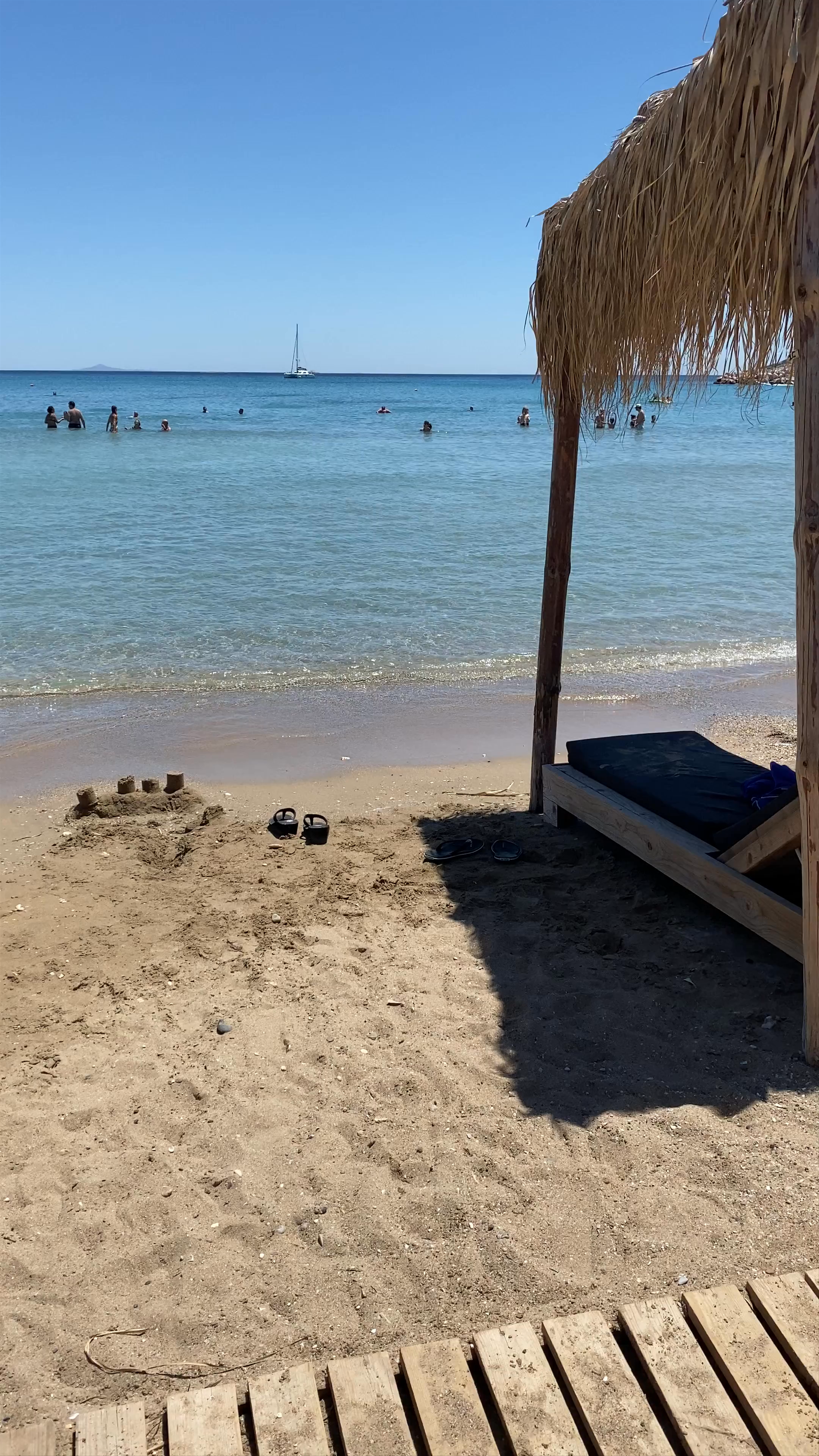 Sunny Beach Day at Vouliagmeni Beach, Greece