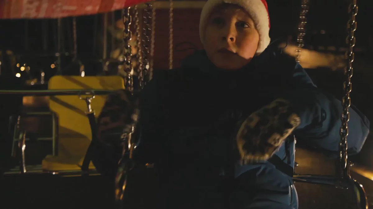 A boy taking a thrilling carousel  in Kongeparken, and creating Christmas ornaments in a Christmas workshop with his mom