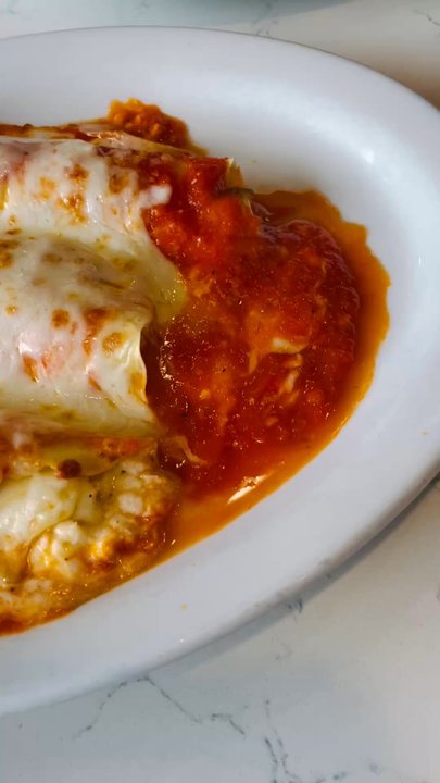 Caffe Positano - Baked Manicotti - Italian Near Me - Apopka, Florida