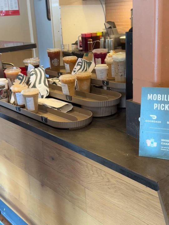 Starbucks - All the drinks lined up of people that think they have to wait long. But not in this store. - Coffee & Tea Near Me - Queens, New York