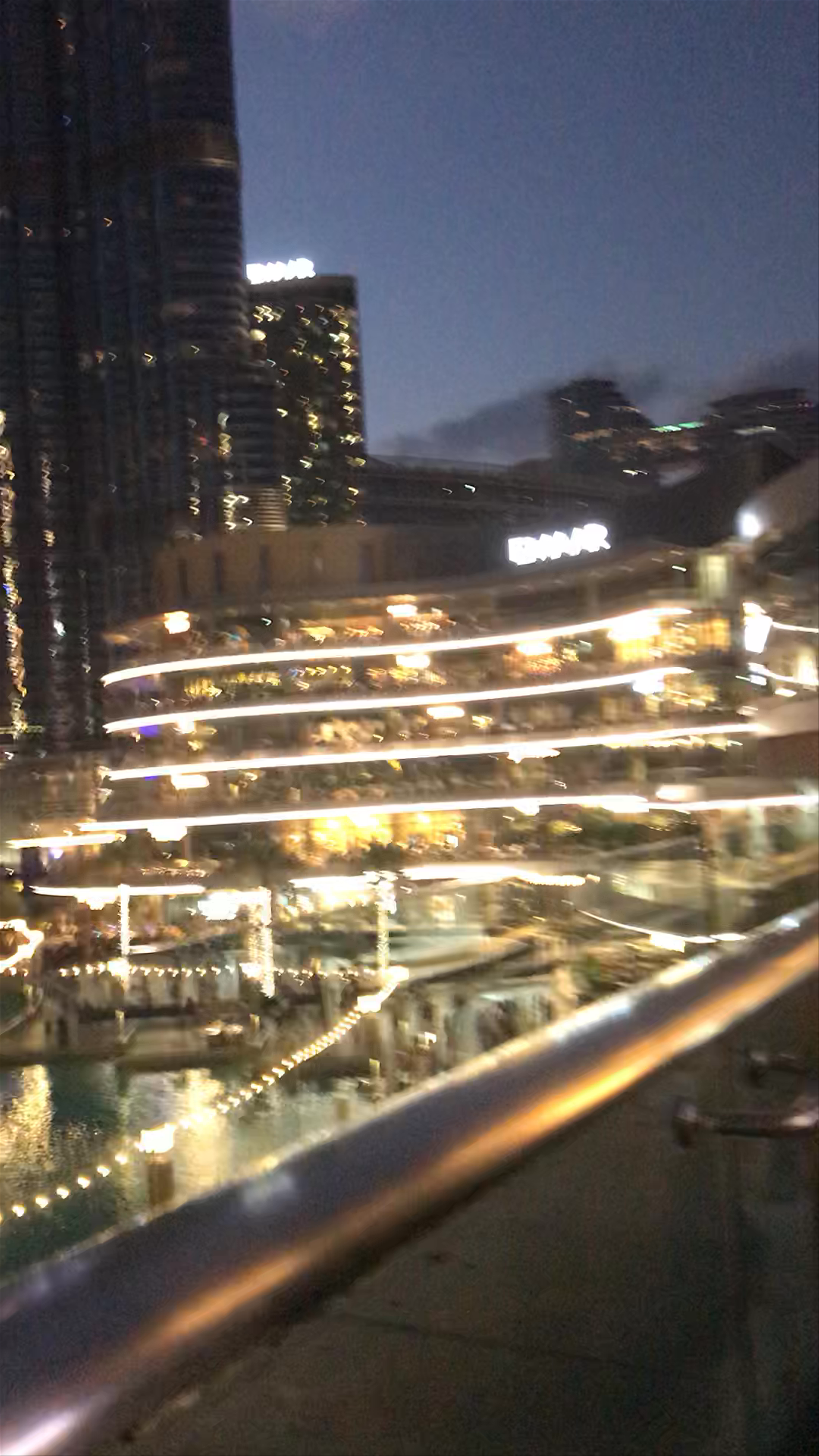 Twilight in Downtown Dubai: Stunning Nightscape of the Burj Khalifa and Dubai Fountain