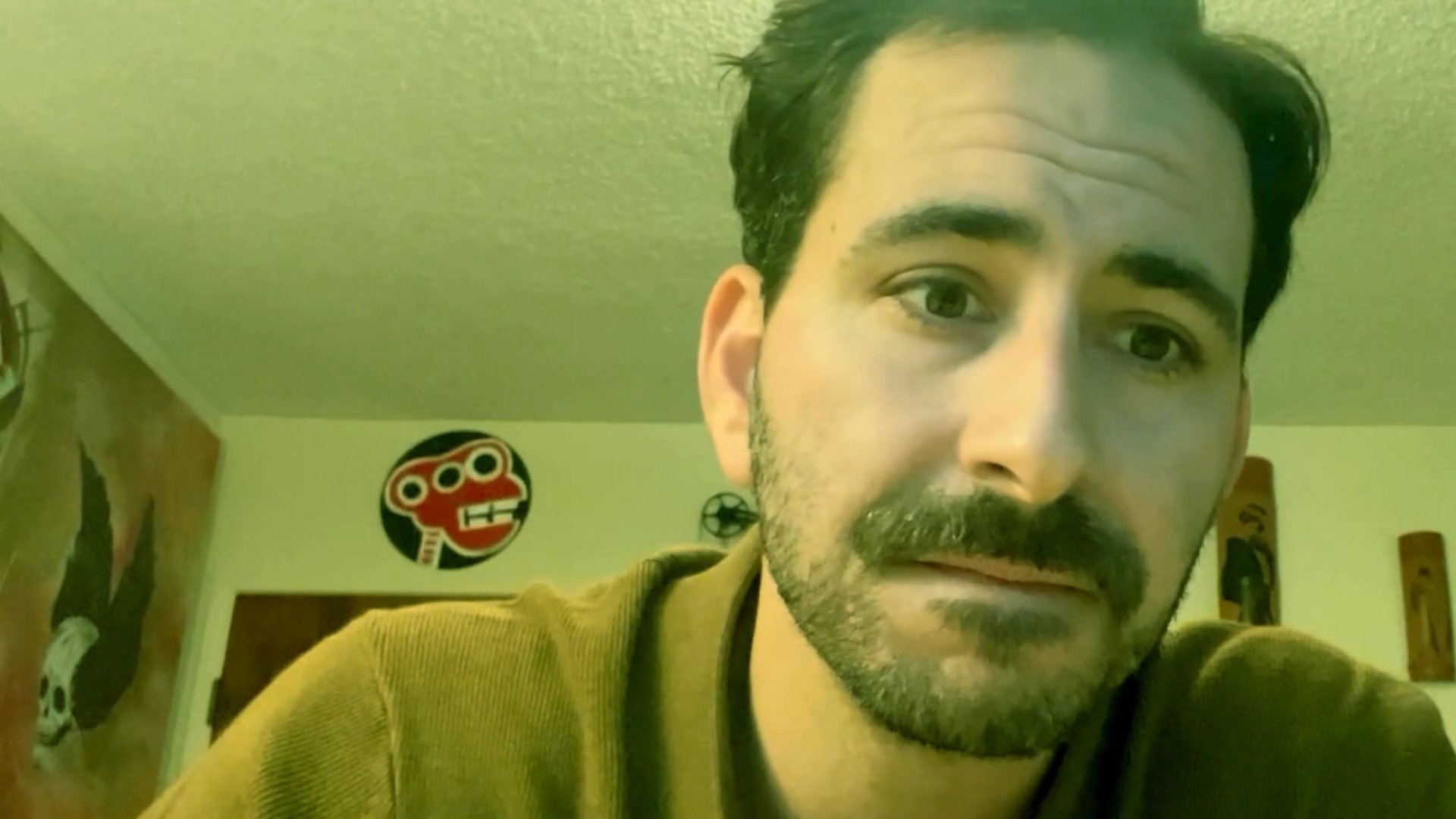 Individuals participate in an intimate video call, exchanging emotional dialogue while viewed through separate webcams. The interaction captures a sequence of expressive reactions and thoughtful communication between parties in different locations.