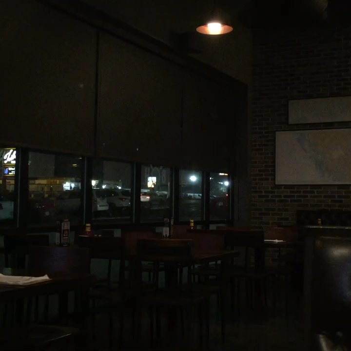 Burgerhaus - Vibe- lots of reclaimed wood and brick with an industrial edge. The drop ceiling is over the bar. - Burgers Near Me - Schererville, Indiana