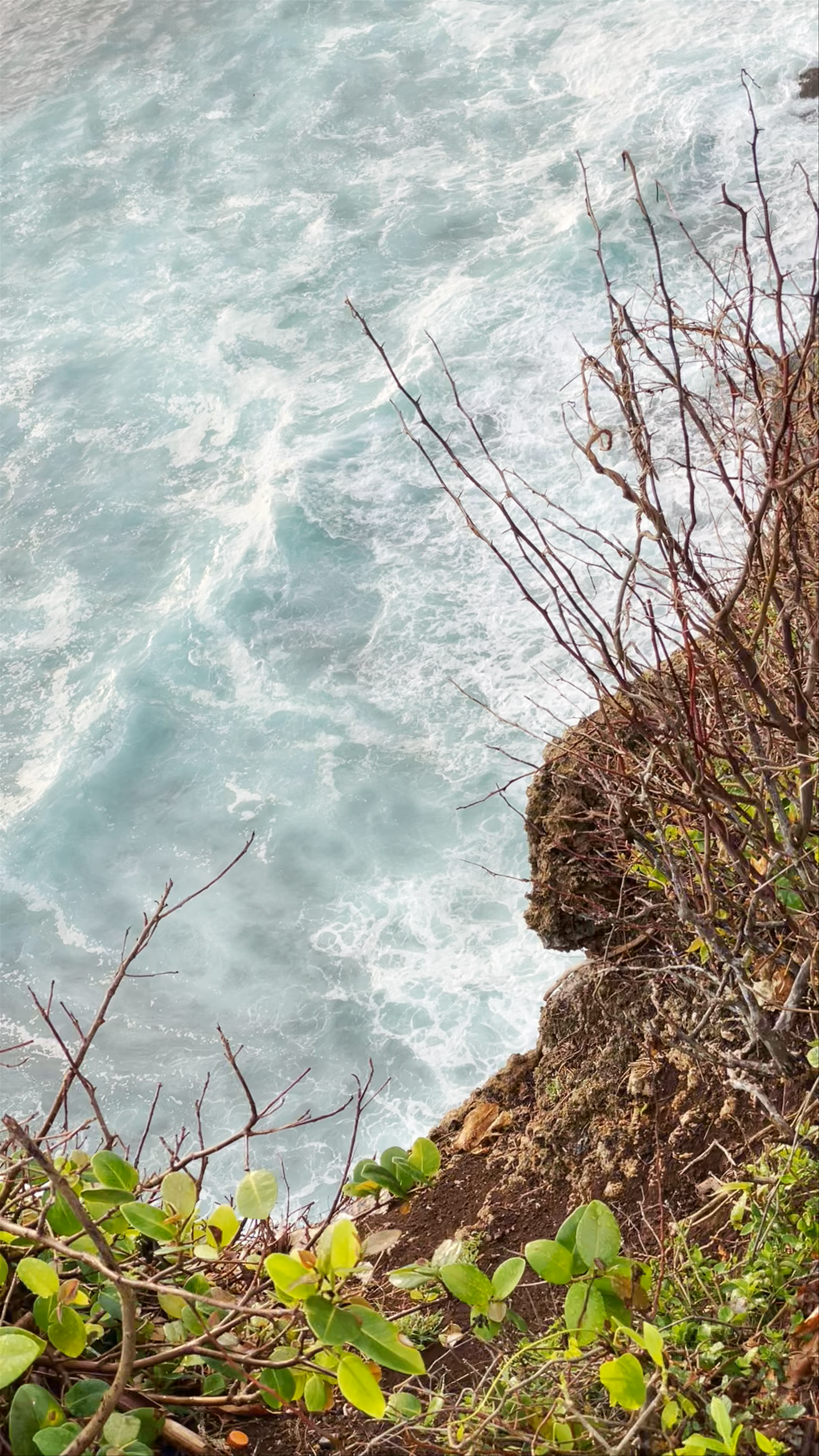 Uluwatu Temple Cliffside Views and Ocean Waves in Bali