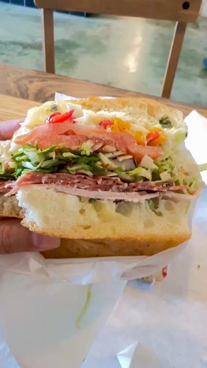 Luke's - Italian Sandwich after bite. So good!! - Sandwiches Near Me - Ventura, California