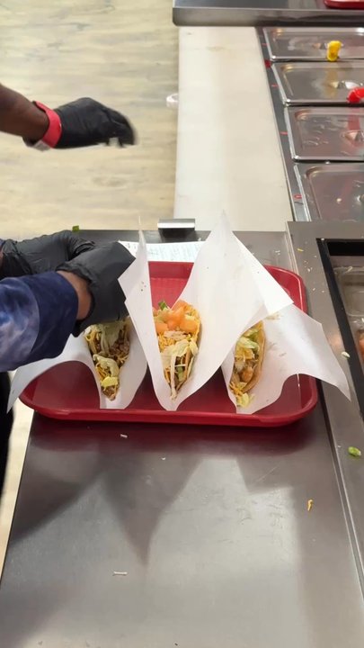 Southern Taco - The build of the Shrimp Crawfish and Turkey tacos with all the trimmings including the Whop Whop sauce. Delicious! - Tacos Near Me - Baldwin Hills, California