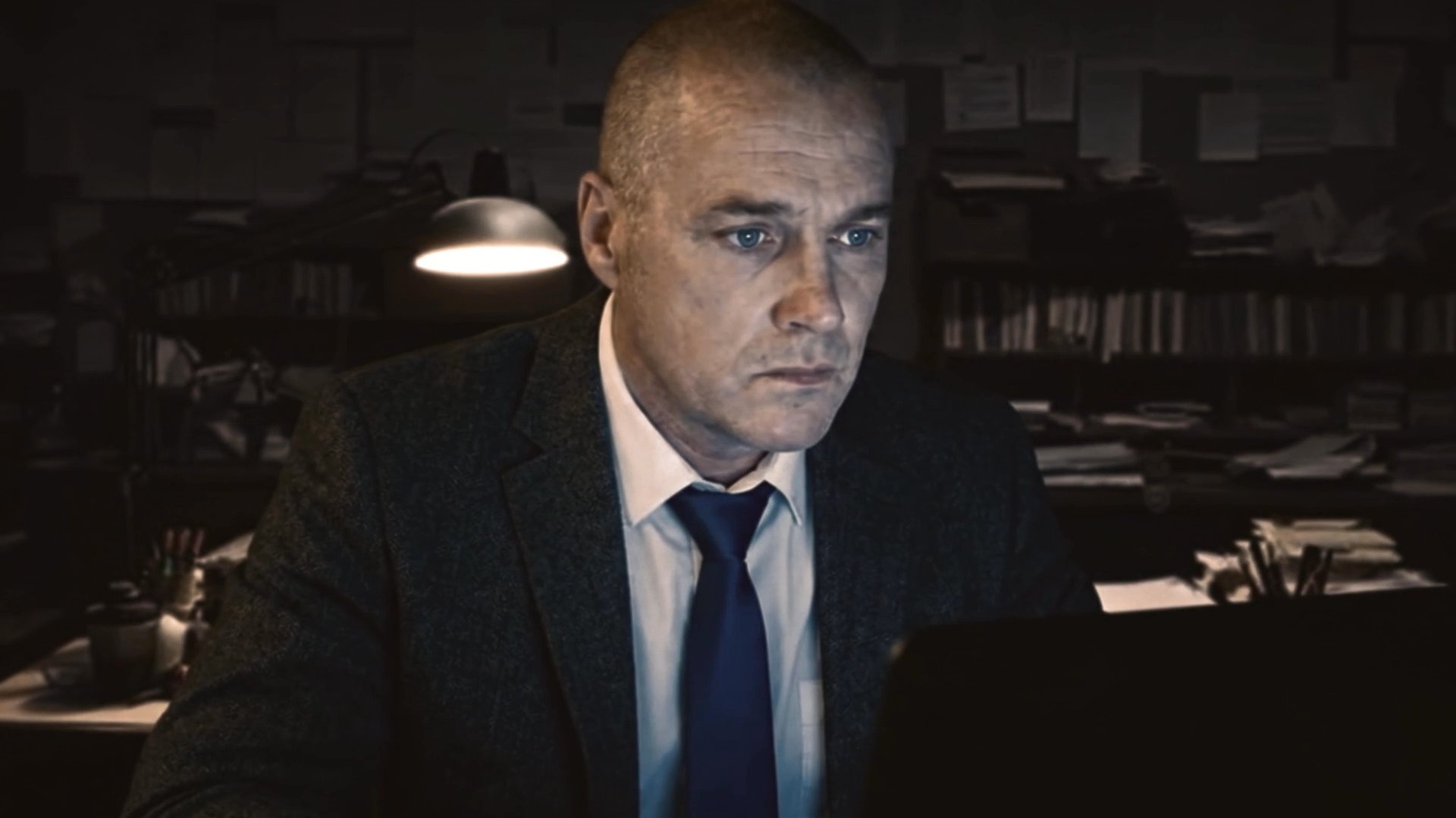 An intelligence analyst monitors a video evidence feed within a secure digital terminal interface. The sequence highlights the process of reviewing case data in a professional, investigative environment.